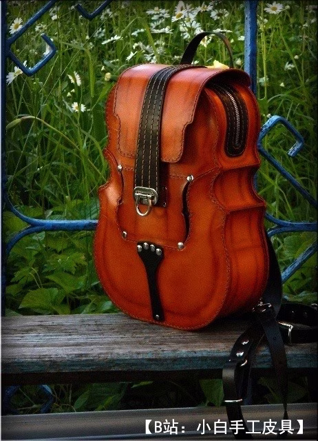 小提琴形状的皮革背包的图案 - 1