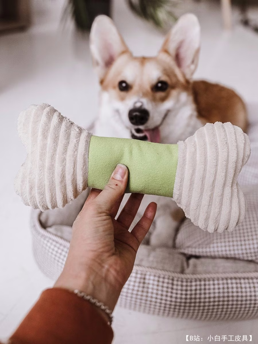 狗“骨头”毛绒玩具的图案 - 1