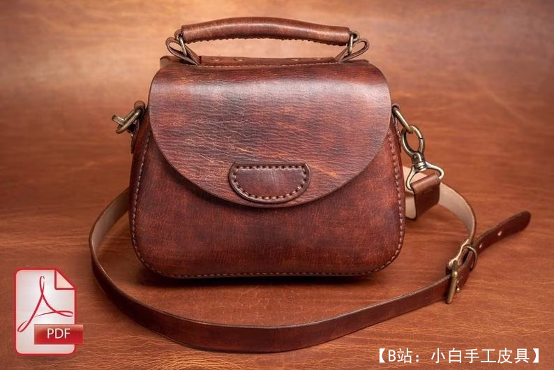 手拿小皮革女式手提包的图案 - 1