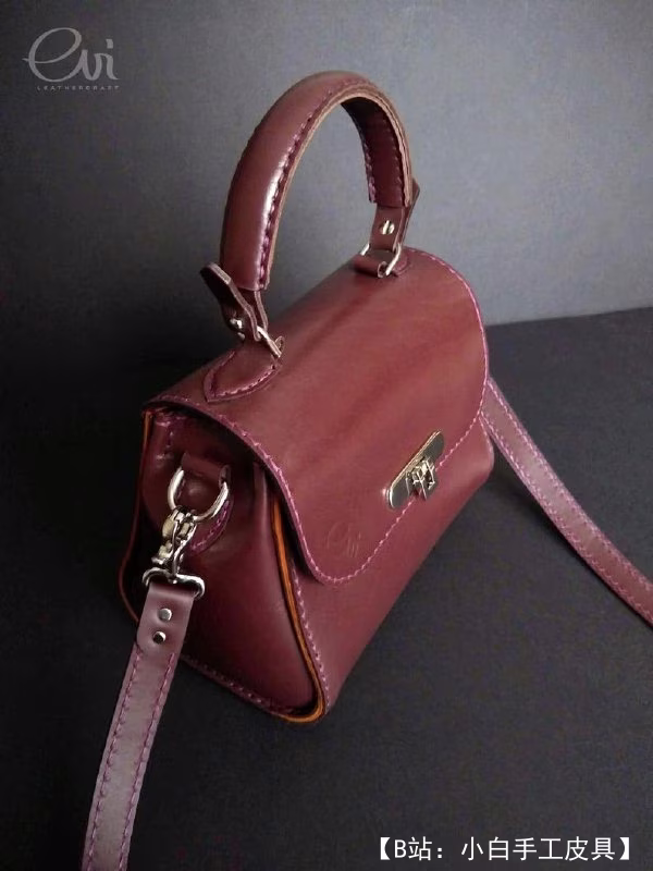 带大提手的小型皮革女式手提包的图案 - 1