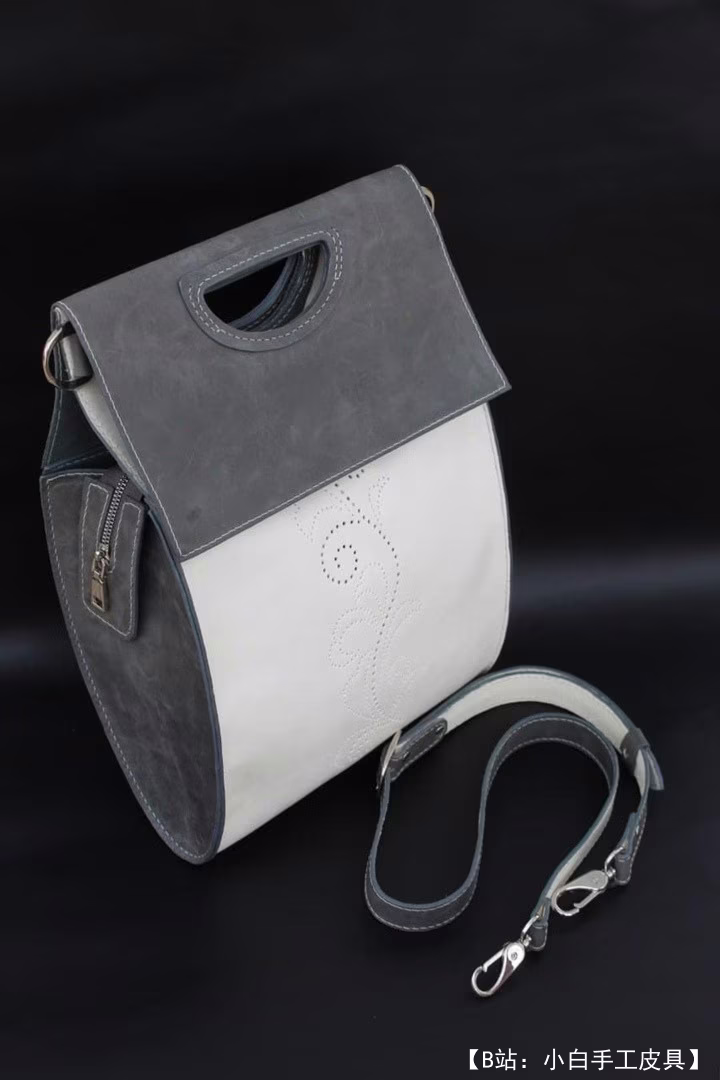 手拿真皮女包图案 - 1