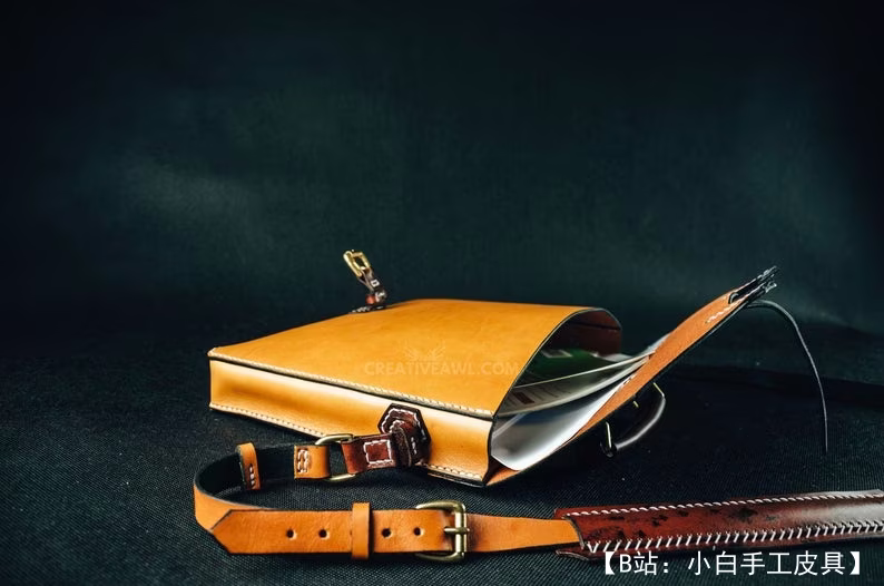 带皮带的皮革公文包的图案 - 2